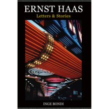 A book cover that reads ERNST HAAS: Letters & Stories with an image of neon signs