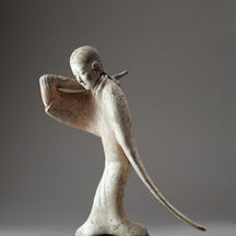 Sculpture of a person in motion