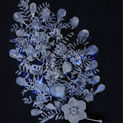 An intricate blue, white, and gray rendering of a flowering plant against a black background