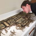Aaron Stevens, Class of 2018, examining a naaxein (Chilkat) dance apron (PU 5257) as part of his senior thesis research into the Sheldon Jackson collection of Northwest coast material culture.