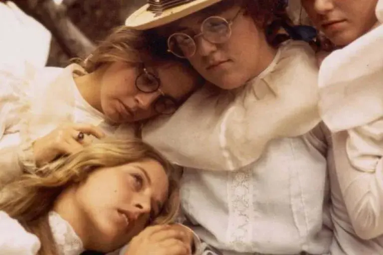 Characters from Picnic at Hanging Rock piled together.