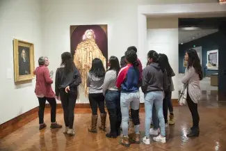 Group of people looking at artwork